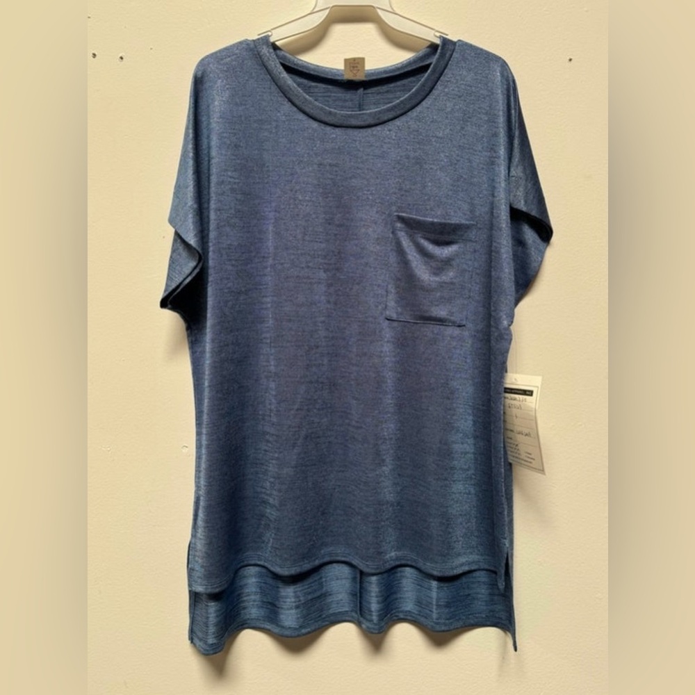 NWOT Sew In Live Top with Slight Shimmer. Color name is denim.